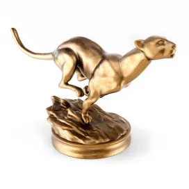 A bronze statue of a cheetah